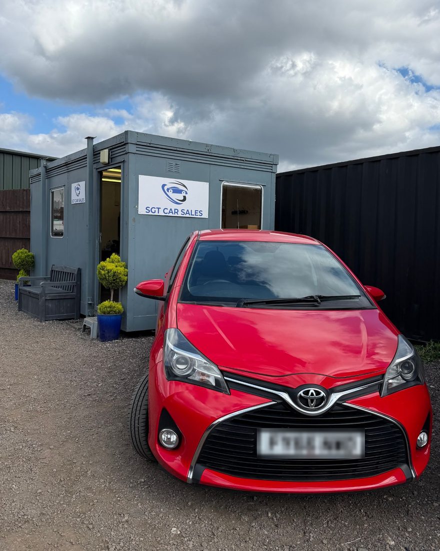 Lina's red Toyota Yaris at a car dealer in Southend-on-Sea, Essex, after its Premium pre-purchase inspection